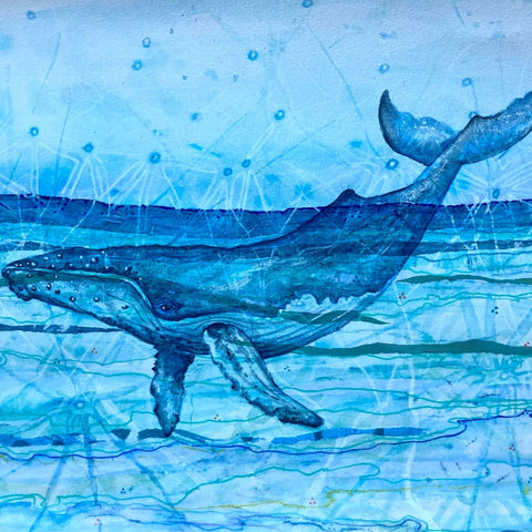Blue whale illustration on a blue watercolor background
