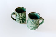 Mystical Green Convex Mugs by Kim Potter