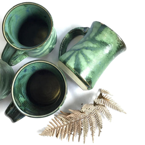 Mystical Green Concave Mugs by Kim Potter